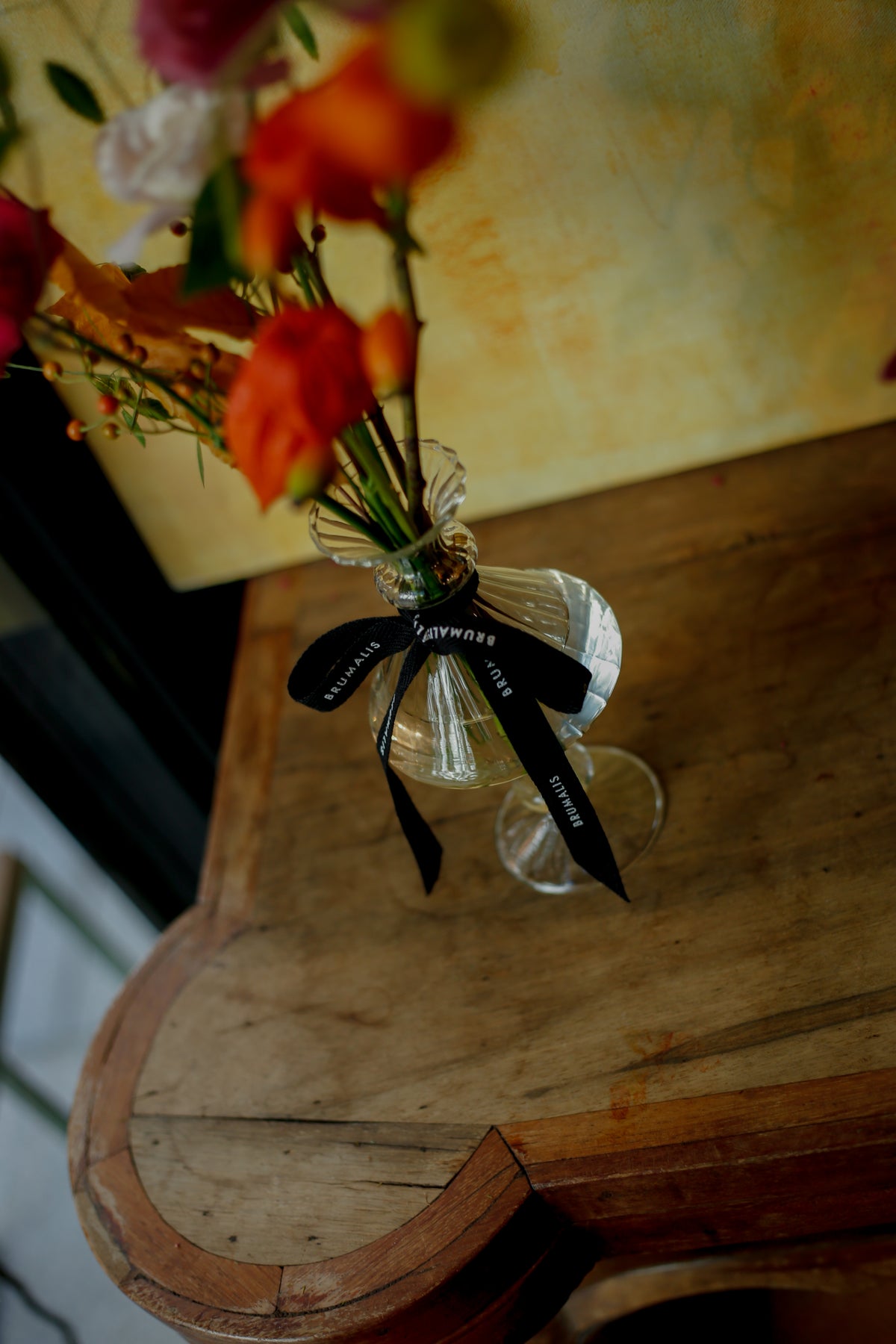 Flores otoñales en botellita especial