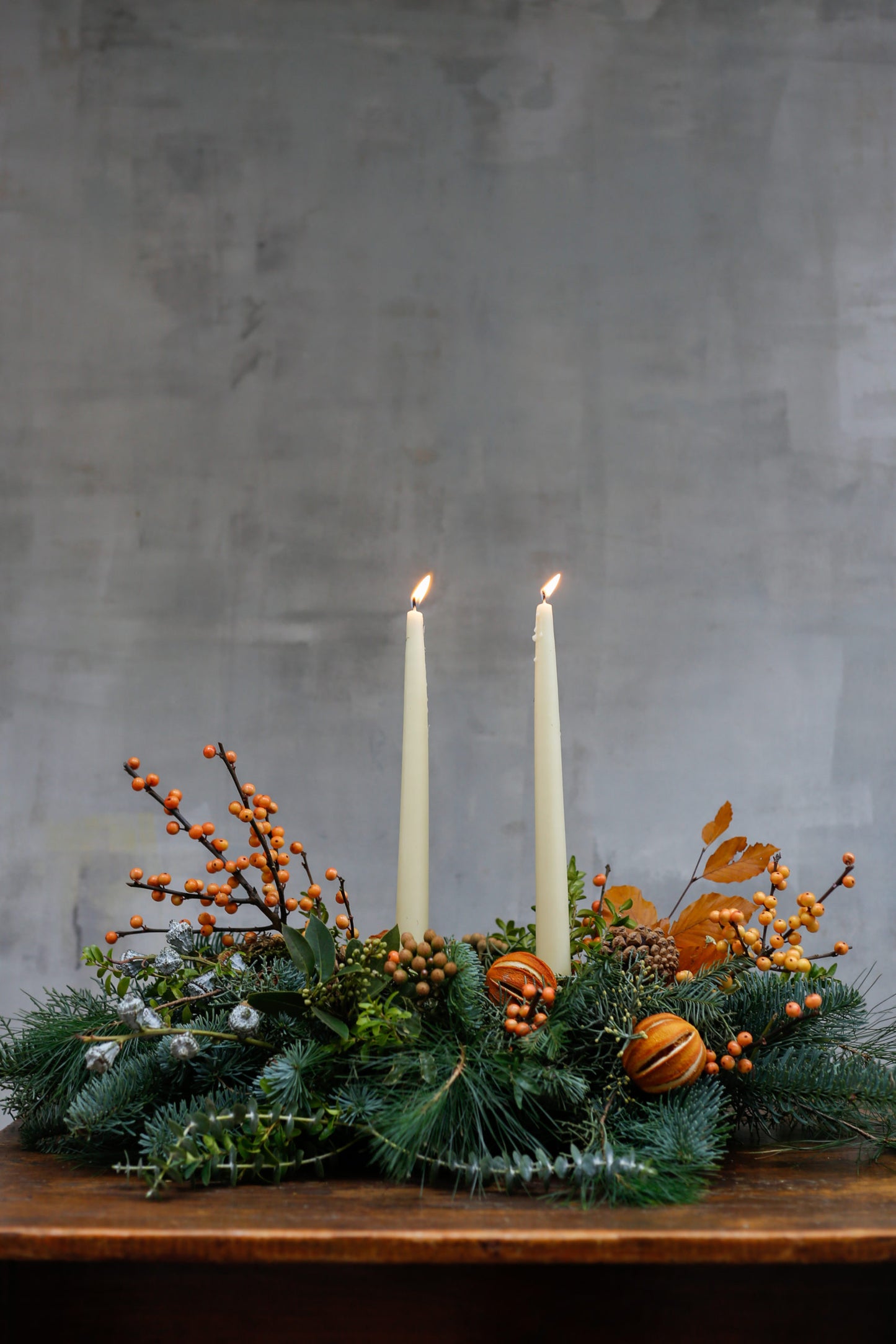 Centro de mesa de Navidad con naranjas