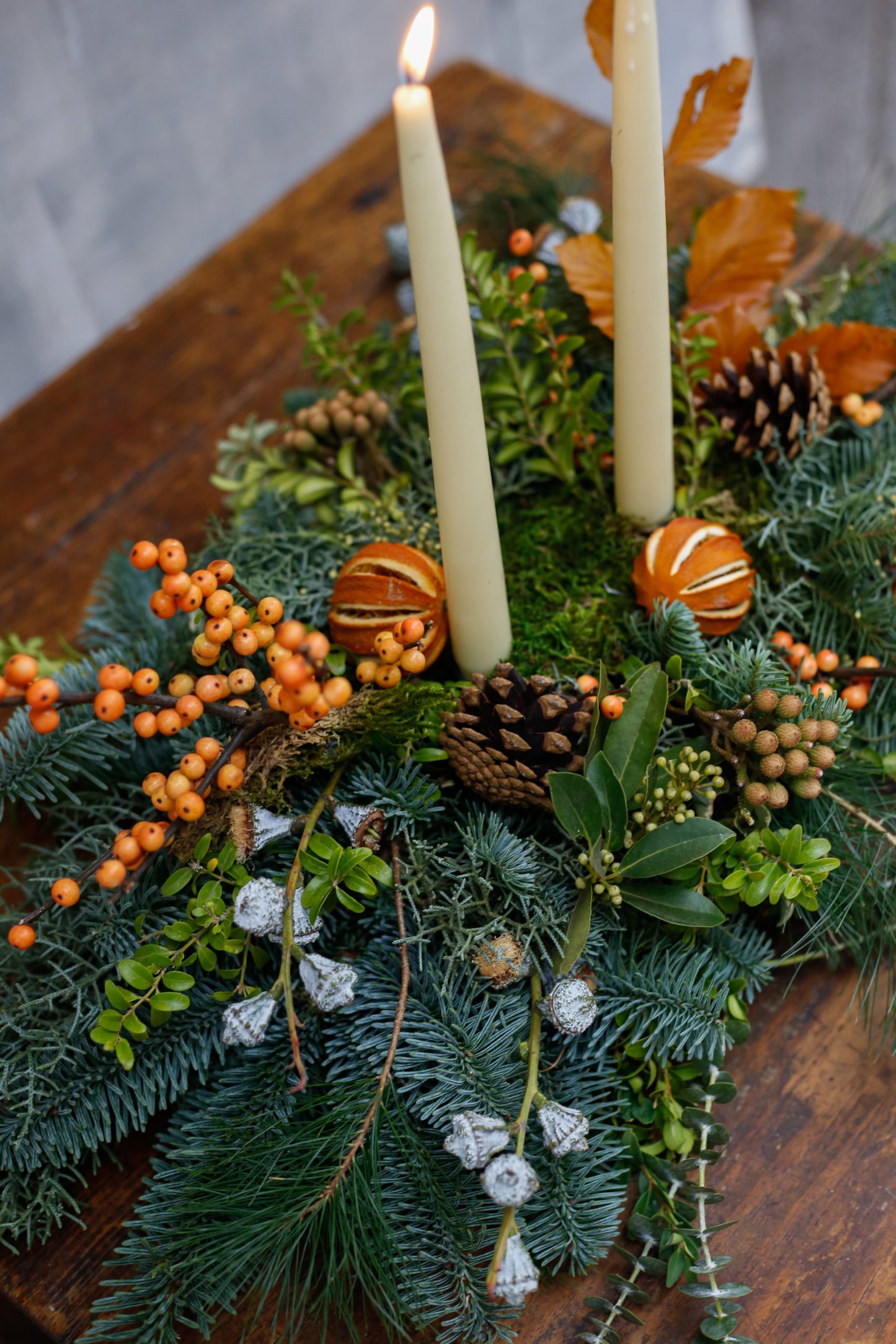 Centro de mesa de Navidad con naranjas