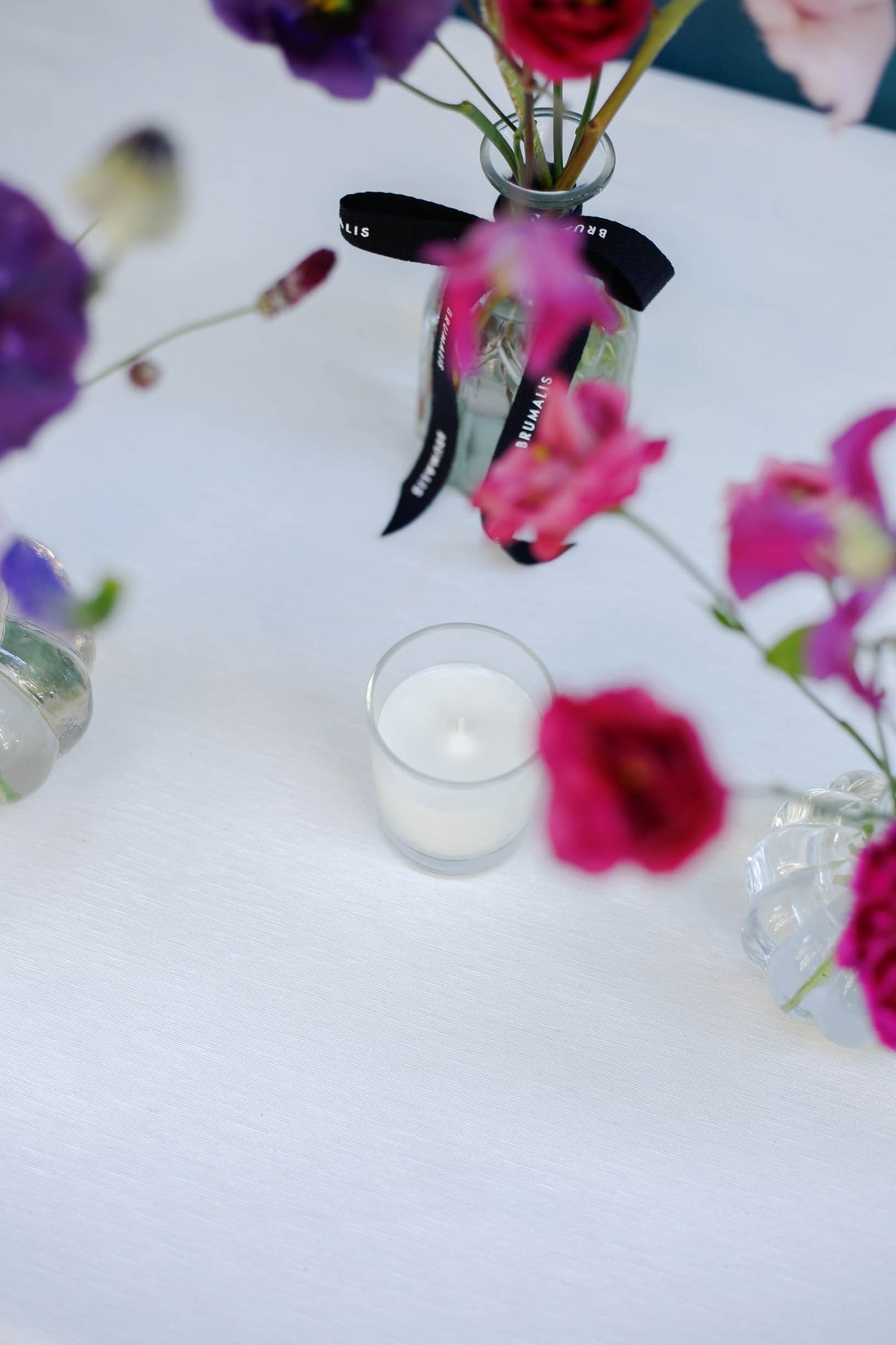 Set de 4 botellitas con flores de temporada