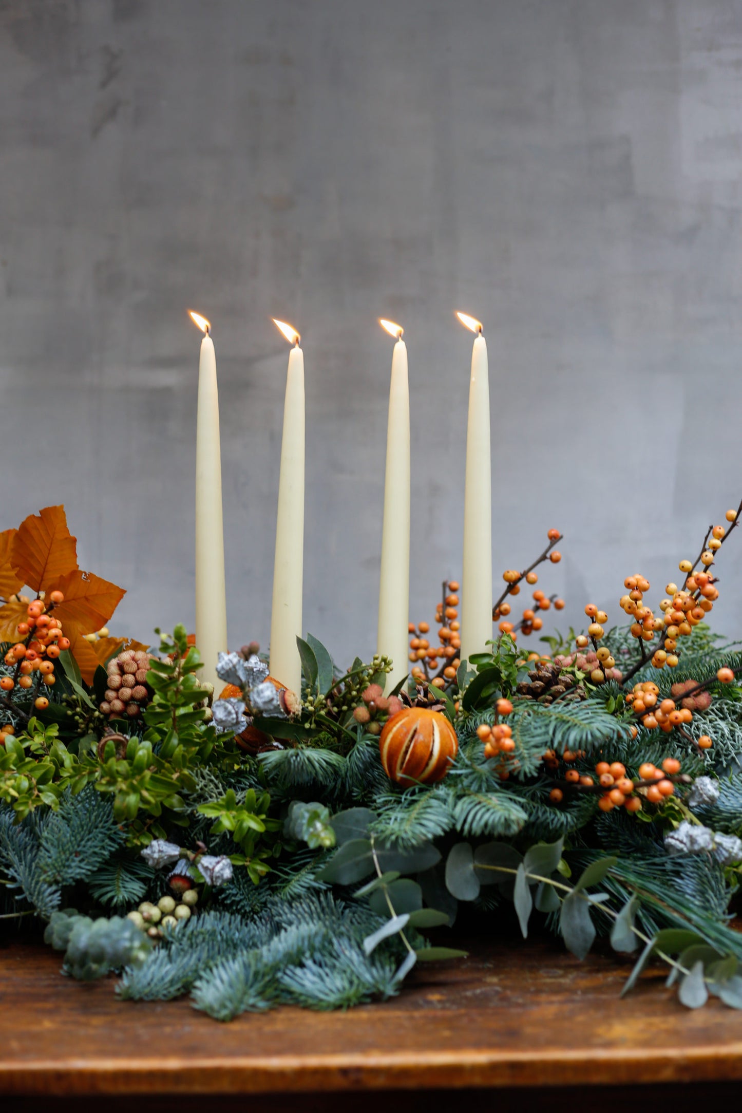 Centro de mesa de Navidad con naranjas