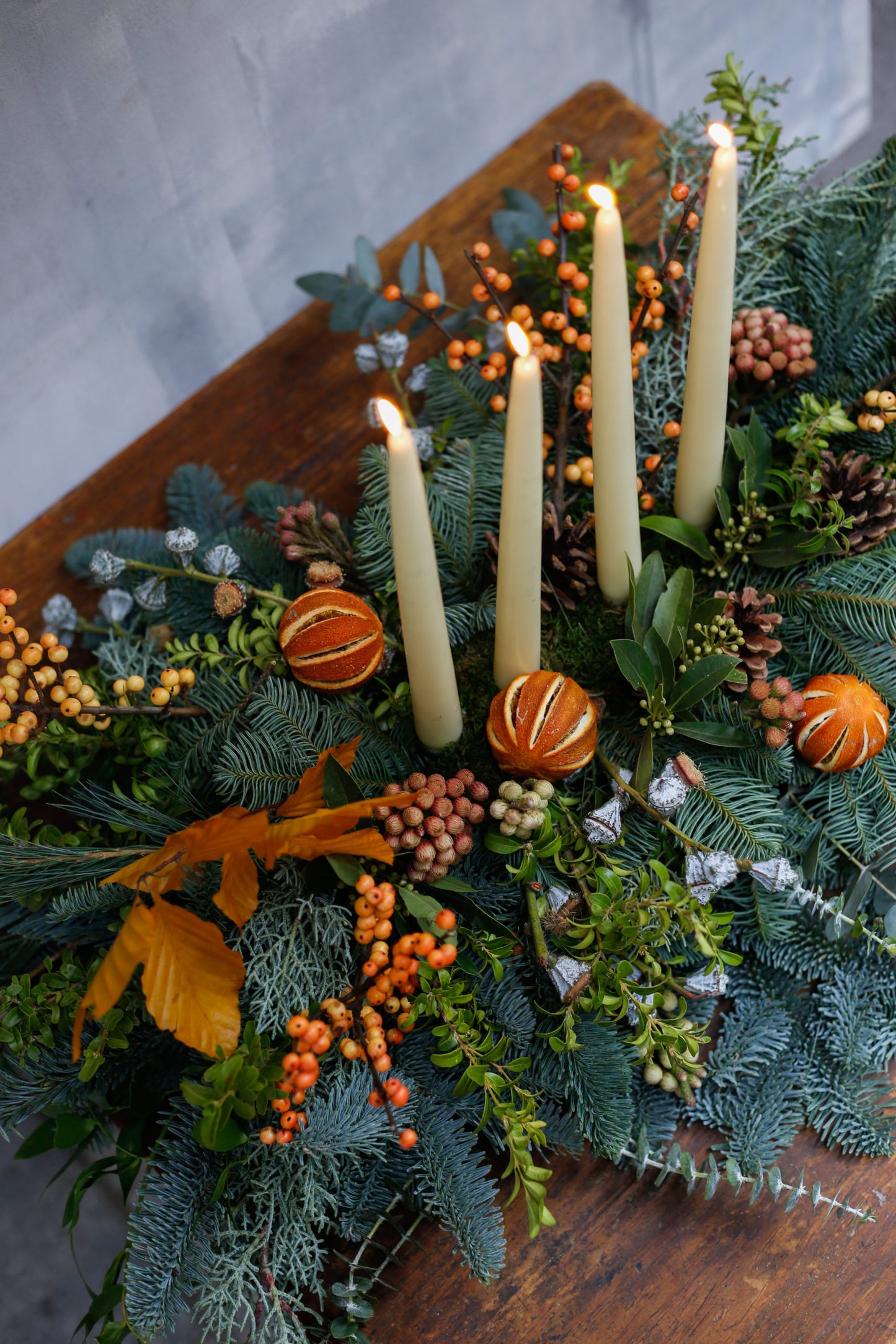 Centro de mesa de Navidad con naranjas
