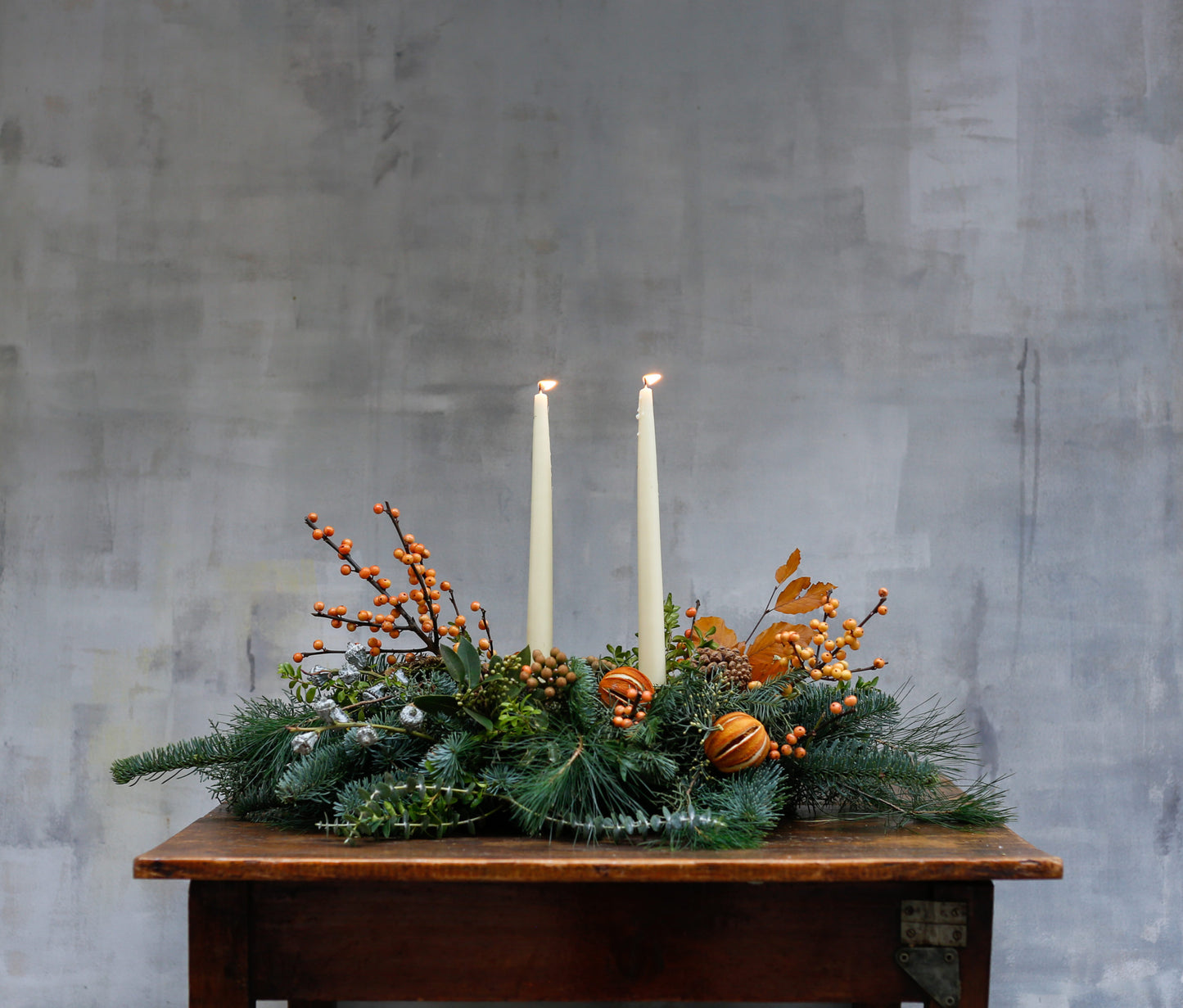 Centro de mesa de Navidad con naranjas